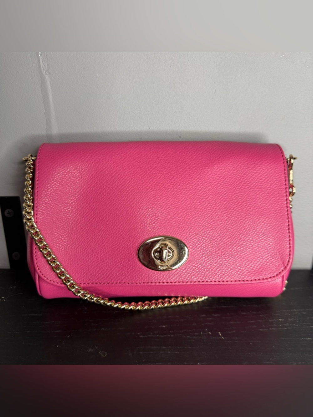 Pink Coach-style handbag – fashionable, elegant, and practical